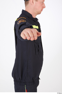 Sam Atkins Fireman in Work Uni A Pose upper body…